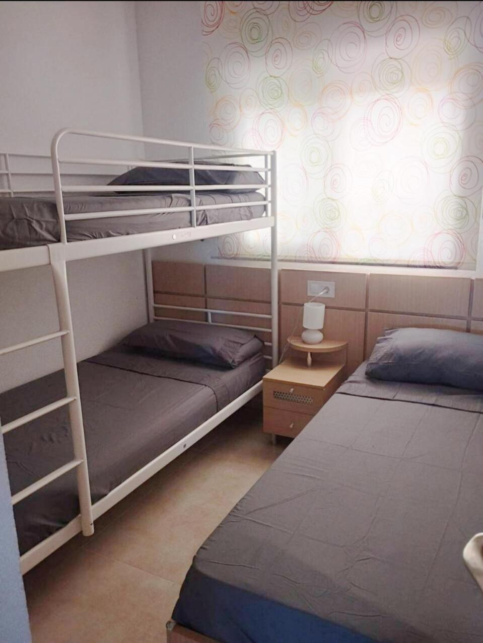 Apartamento Equipado En La Playa Torre La Sal カバネス エクステリア 写真